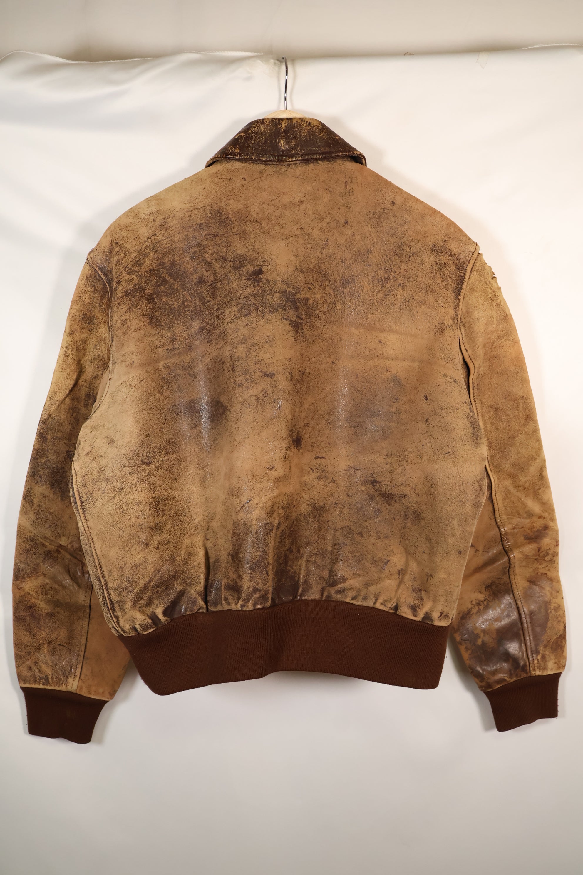 1940's size 46, maker unknown, USAAF A-2 flight jacket, damaged condition, used.