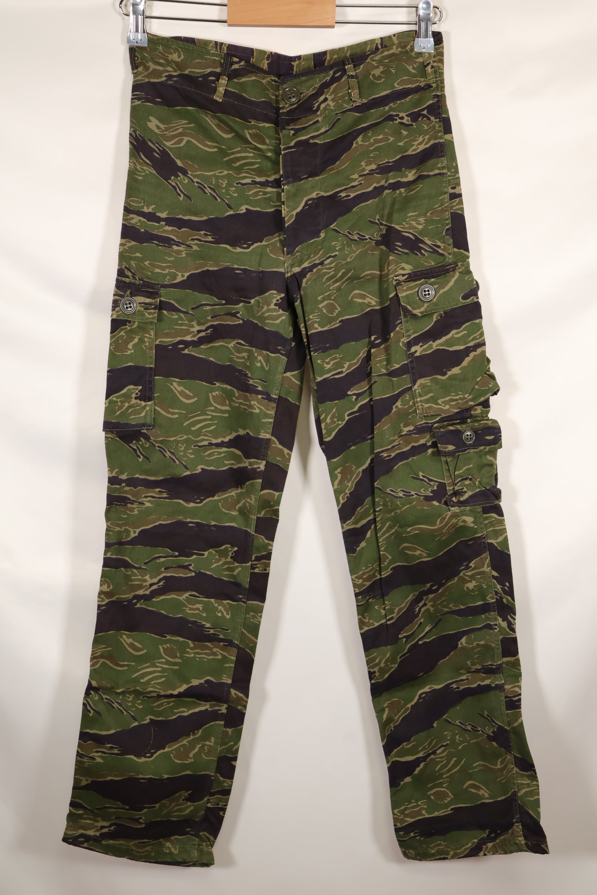 Real tiger stripe pants, gold tiger derived pattern, missing button, almost unused.