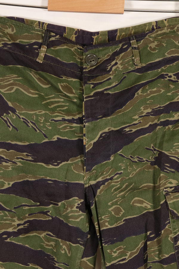 Real tiger stripe pants, gold tiger derived pattern, missing button, almost unused.