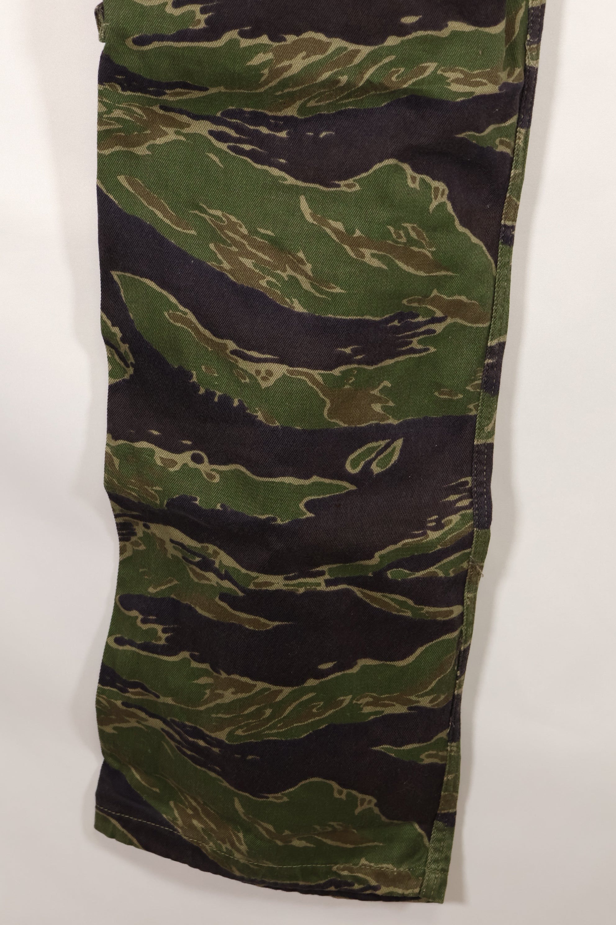Real tiger stripe pants, gold tiger derived pattern, missing button, almost unused.