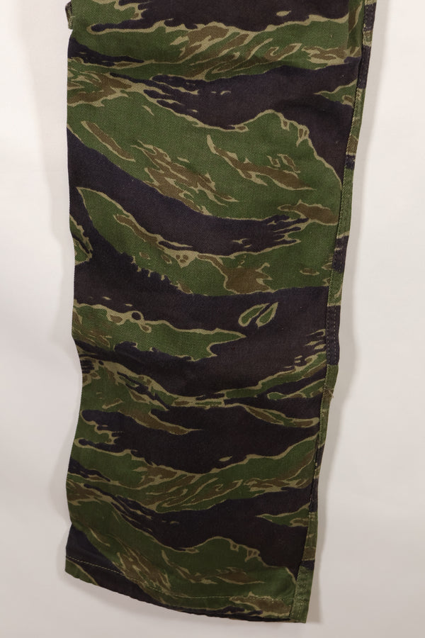 Real tiger stripe pants, gold tiger derived pattern, missing button, almost unused.