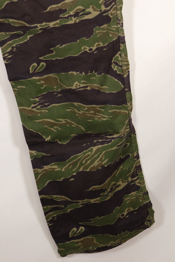 Real tiger stripe pants, gold tiger derived pattern, missing button, almost unused.