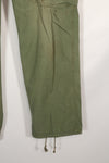 Real 1963 1st Model Jungle Fatigue Pants with leg ties, used.