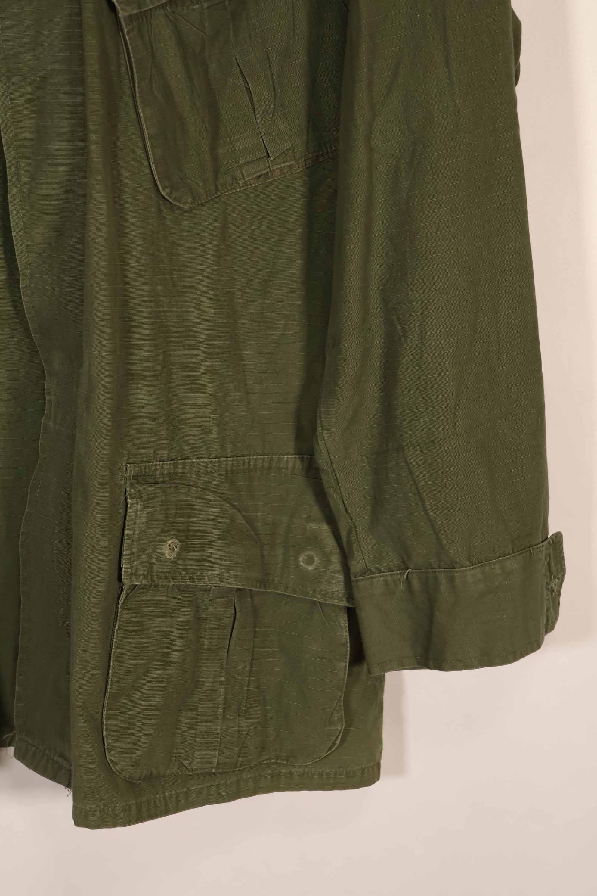 Real 1970 4th Model Jungle Fatigue Jacket M-R with insignia, used.