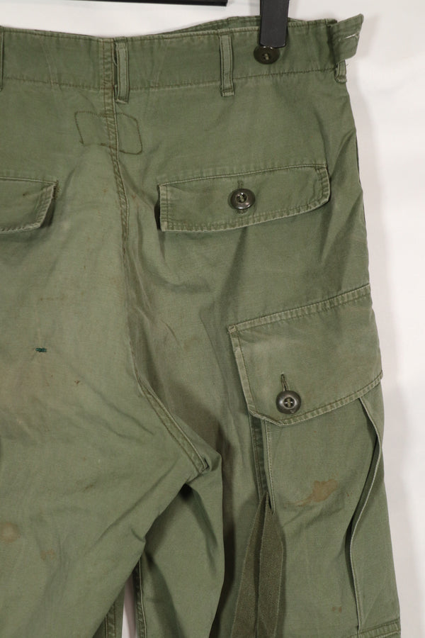 Real 1963 1st Model Jungle Fatigue Pants with leg ties, used.