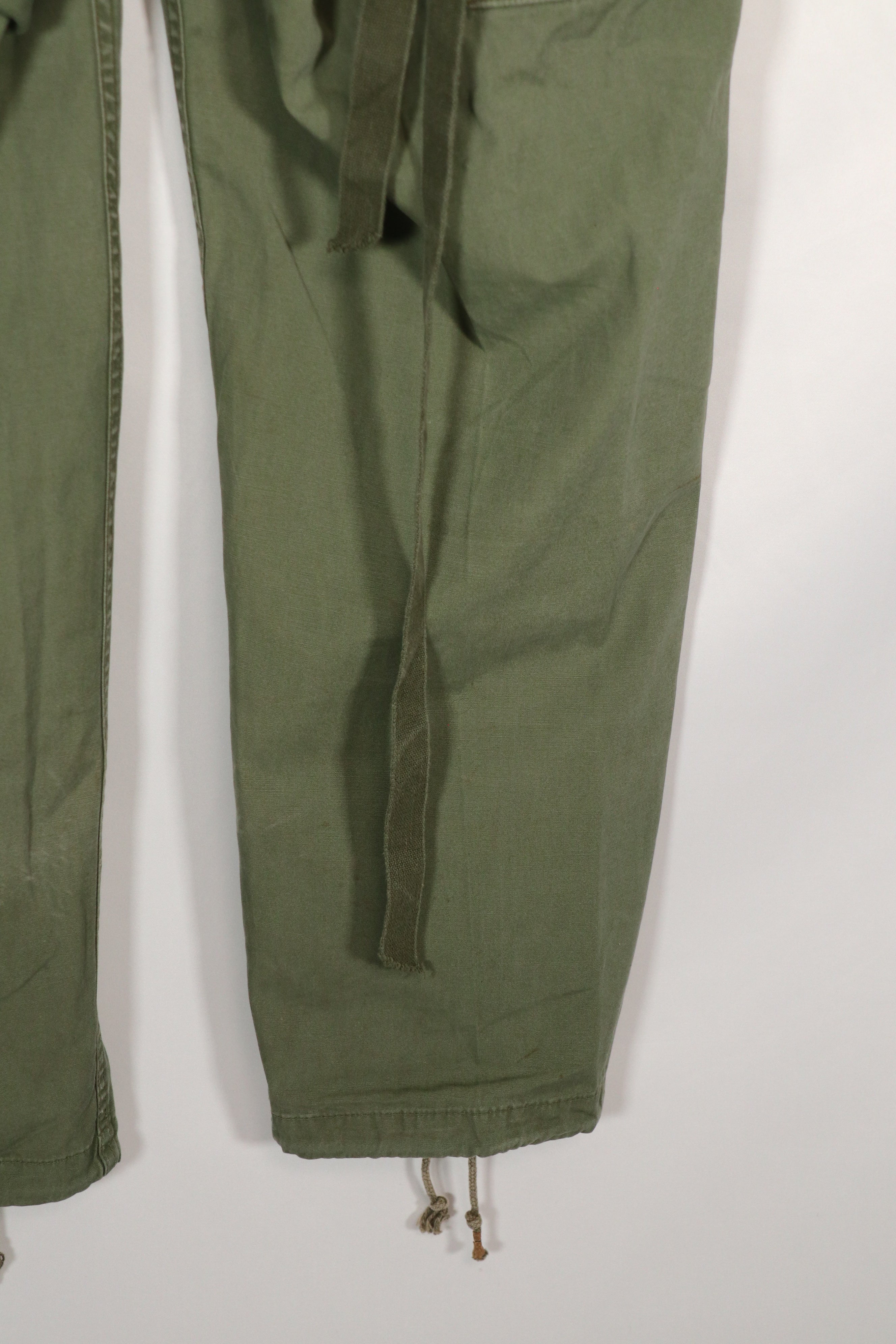 Real 1963 1st Model Jungle Fatigue Pants with leg ties, used.