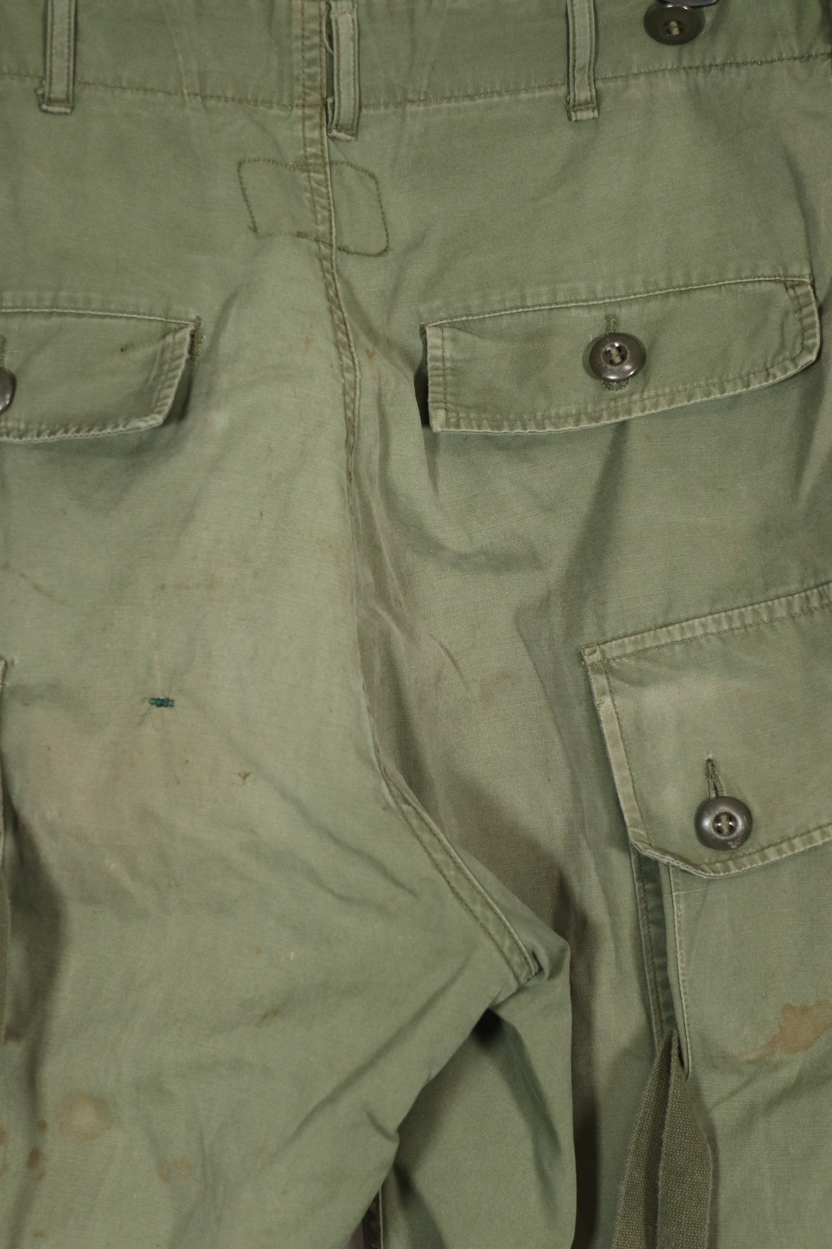 Real 1963 1st Model Jungle Fatigue Pants with leg ties, used.