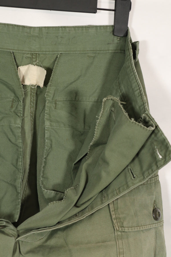 Real 1963 1st Model Jungle Fatigue Pants with leg ties, used.