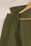 Real 1970 Australian Army OD Fatigue shirt with rank insignia, size unreadable.