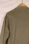 Real 1940s U.S. Marine Corps USMC M41 HBT utility jacket, faded, stained.