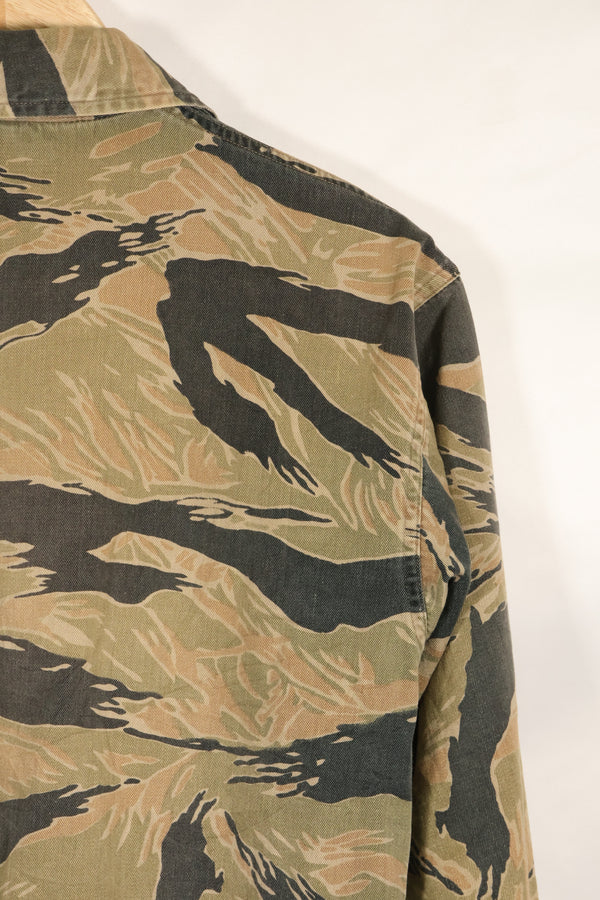 Estimated late 1960s-1970s locally made tiger stripe shirt, used.