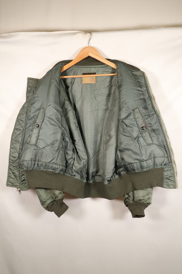 1950s, estimated size 40–42, U.S. Air Force B-15D flight jacket, modified with shearling, includes patches, used