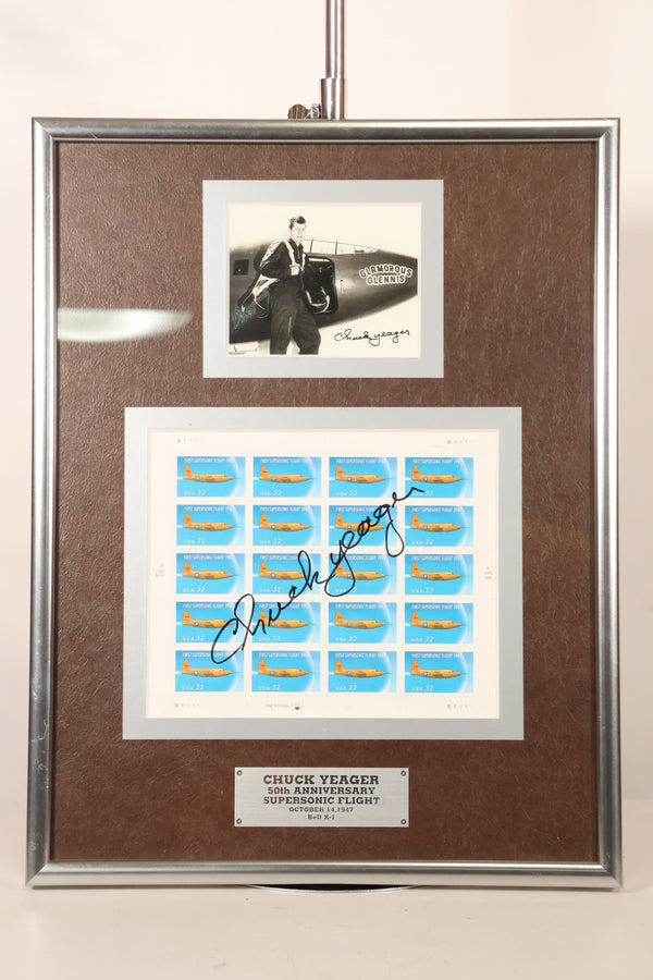 Framed photo and stamp autographed by Air Force Brigadier General Chuck Yeager, commemorating the 50th anniversary of breaking the sound barrier.