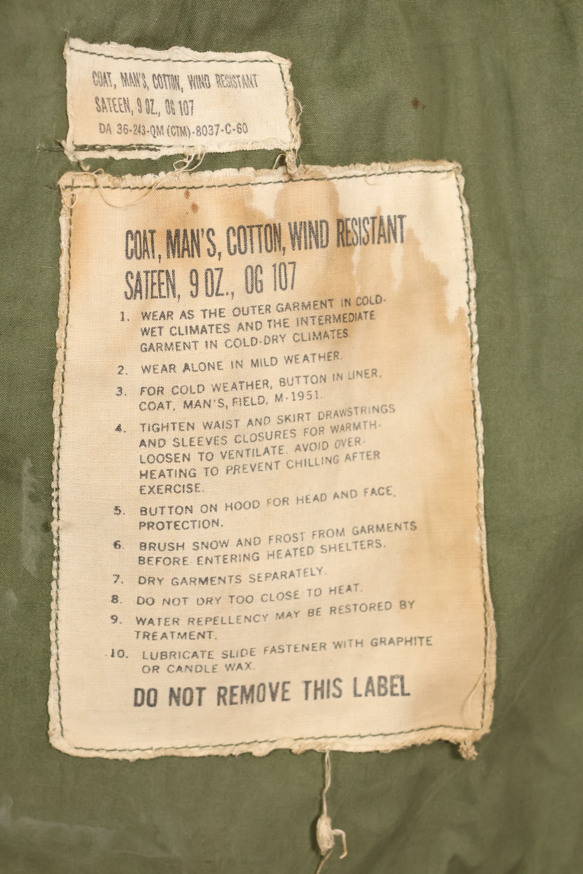 1960 Contract S-S U.S. Army M51 Field Jacket, stained, used.