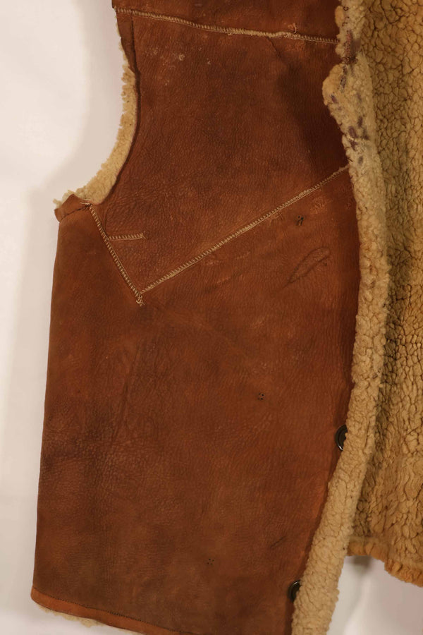 Civilian 1960s-70s sheepskin vest, used, scratches, stains.