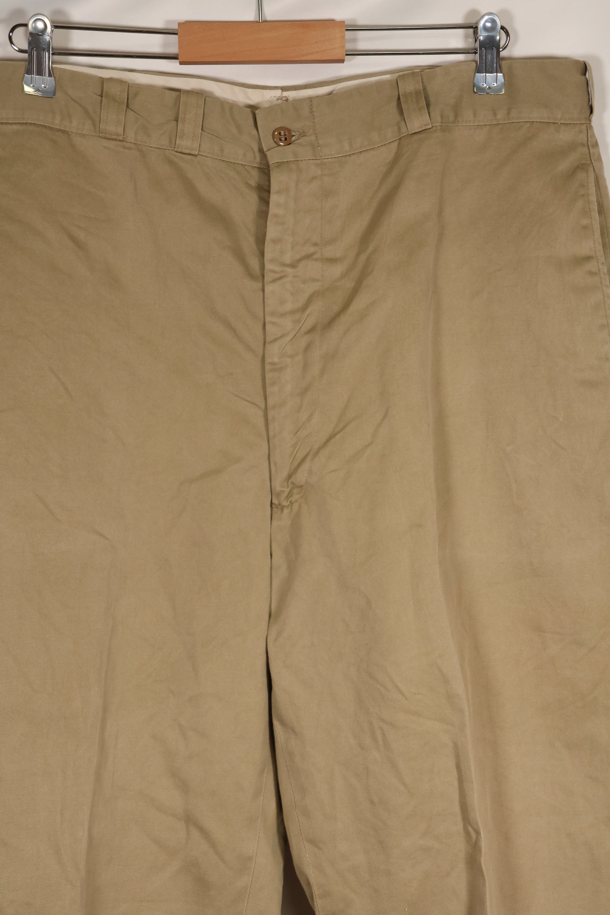 1960s, estimated 34-36 US Army cotton khaki pants, used.