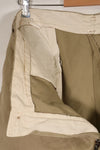 1960s, estimated 34-36 US Army cotton khaki pants, used.