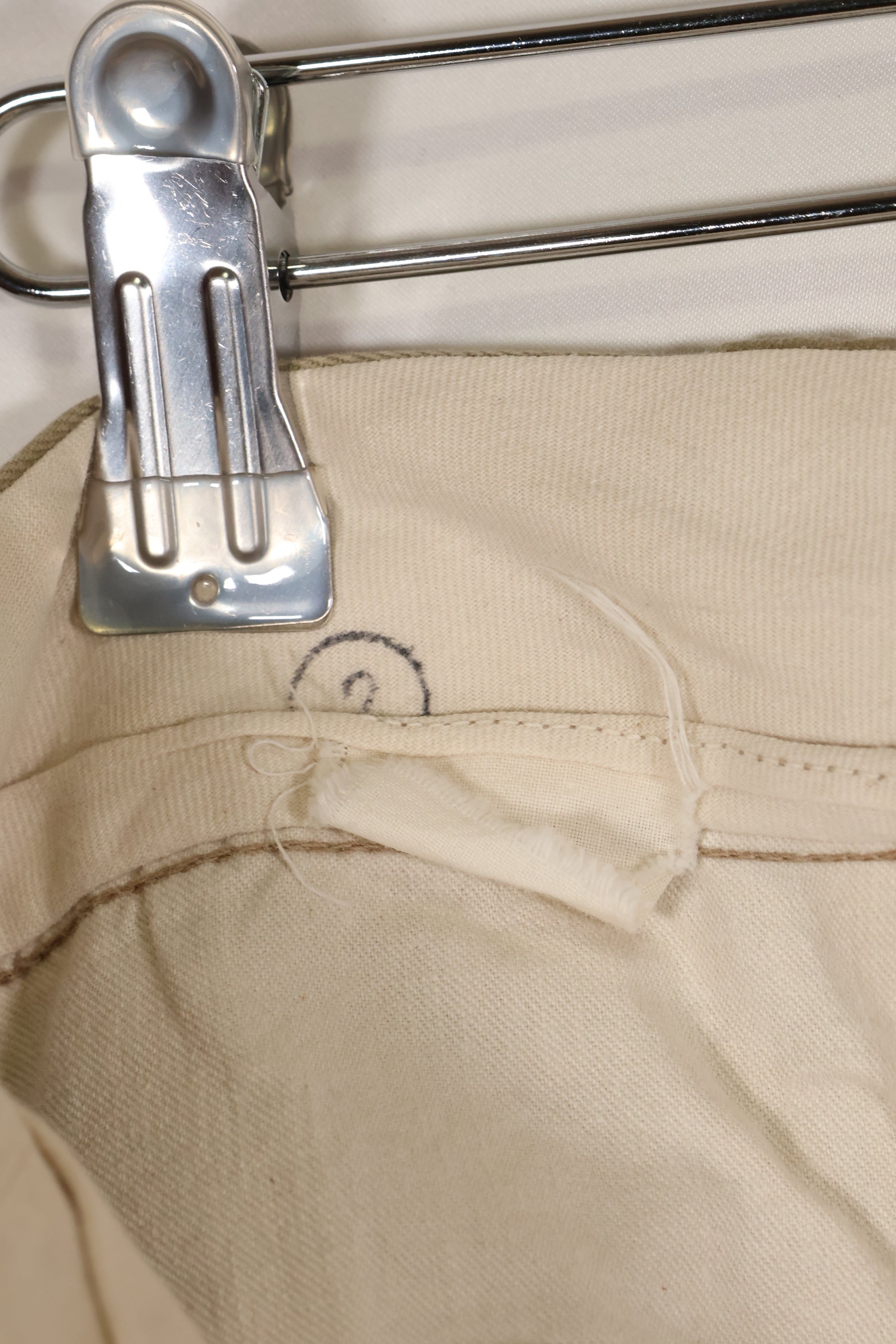 1960s, estimated 34-36 US Army cotton khaki pants, used.