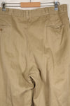 1960s, estimated 34-36 US Army cotton khaki pants, used.