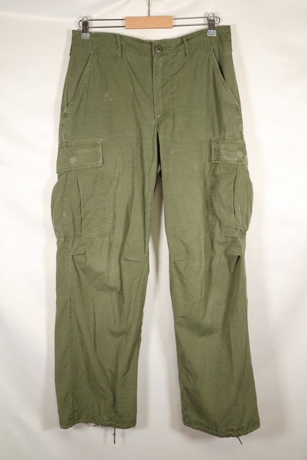 1968 Contract S-R 4th Model Jungle Fatigue Pants, used with fading and repairs.