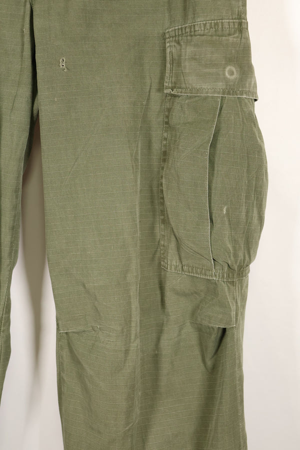 1968 Contract S-R 4th Model Jungle Fatigue Pants, used with fading and repairs.