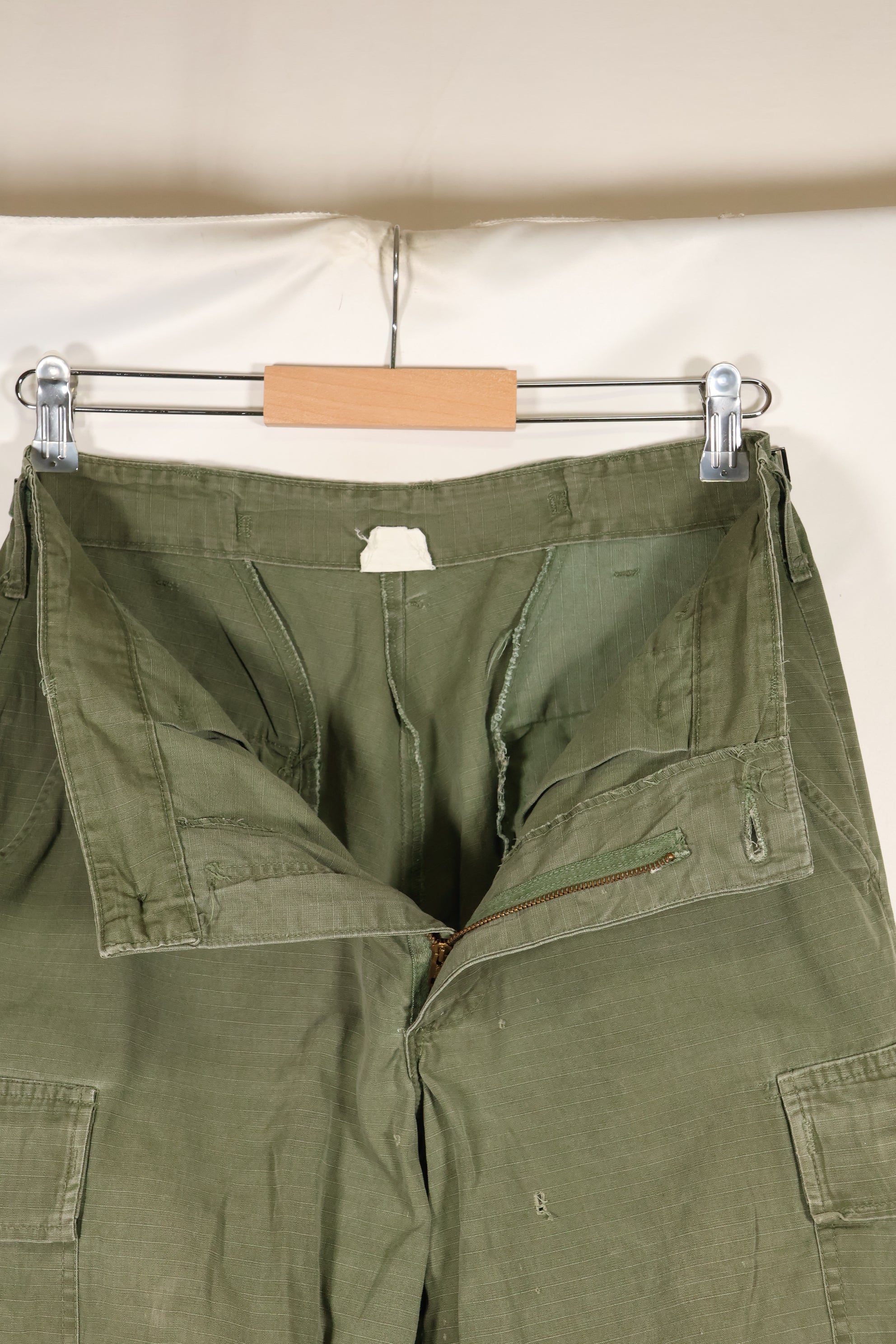1968 Contract S-R 4th Model Jungle Fatigue Pants, used with fading and repairs.