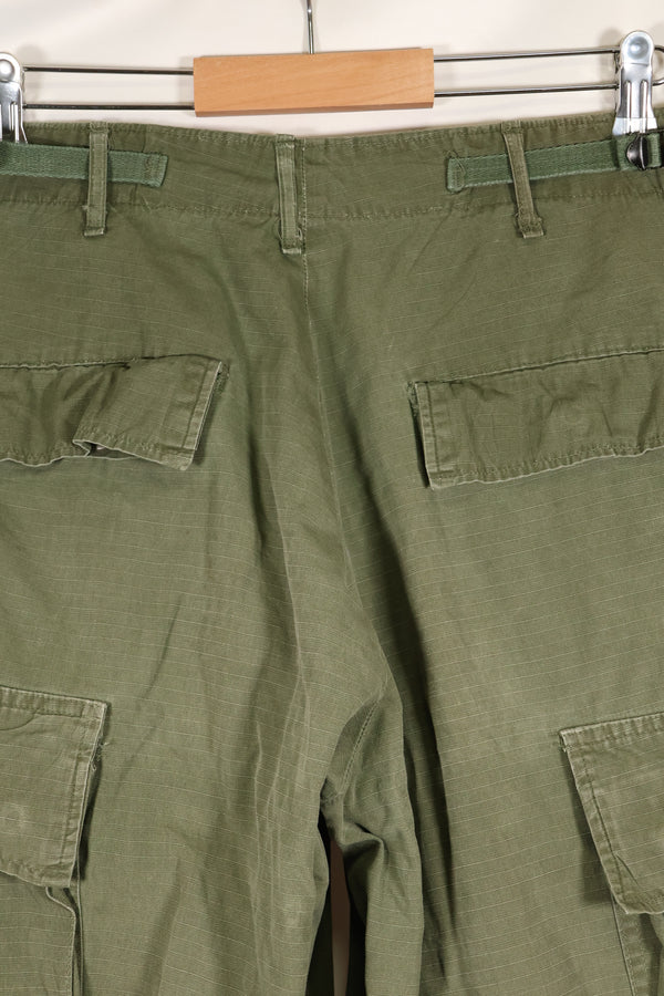 1968 Contract S-R 4th Model Jungle Fatigue Pants, used with fading and repairs.