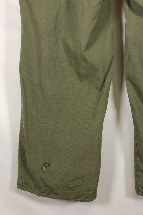 1968 Contract S-R 4th Model Jungle Fatigue Pants, used with fading and repairs.