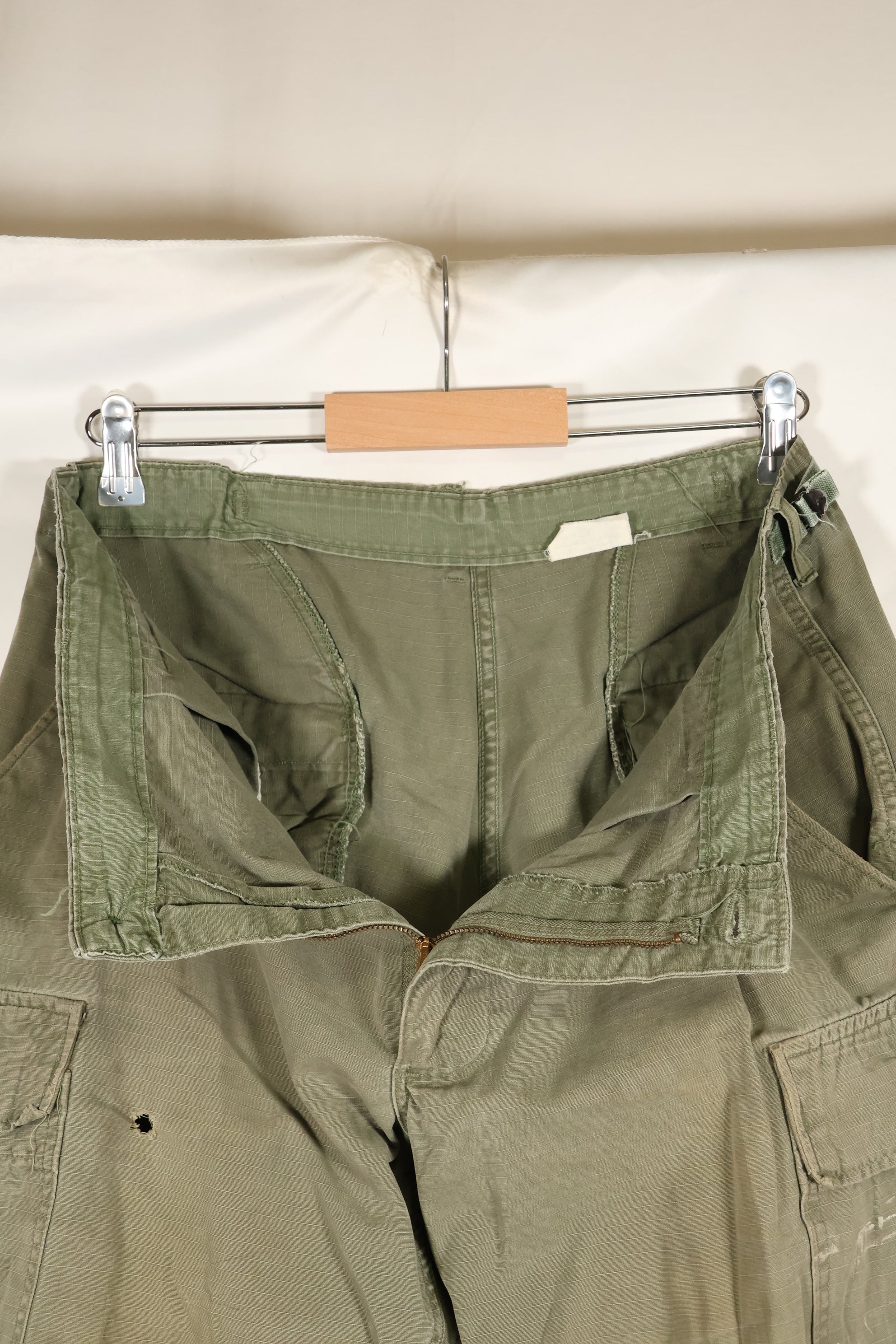 1969 Contract M-R 4th Model Jungle Fatigue Pants, stained, faded, used.