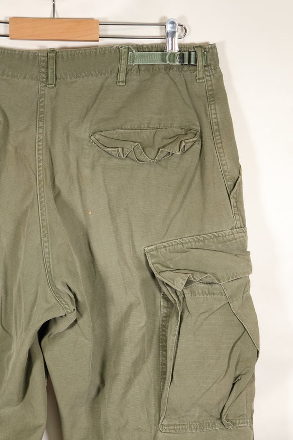 1969 Contract M-R 4th Model Jungle Fatigue Pants, stained, faded, used.
