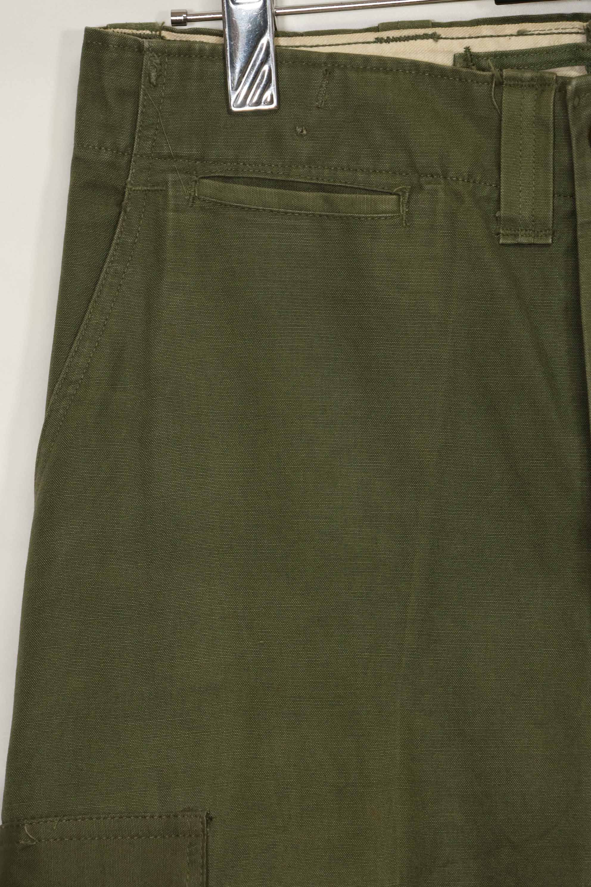 1940s-50s US Army M45 cotton field pants with modified cargo pockets, airborne use, used, B