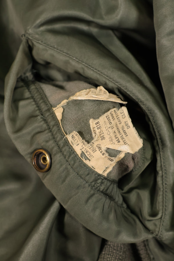 Late 1960's Estimated LARGE US Navy MA-1 Flight Jacket with pilot modifications, used.