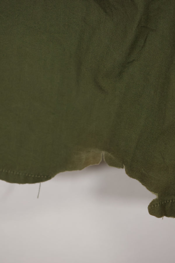 Real 1966-1967 3rd Model Jungle Fatigue Jacket L-R with damage.