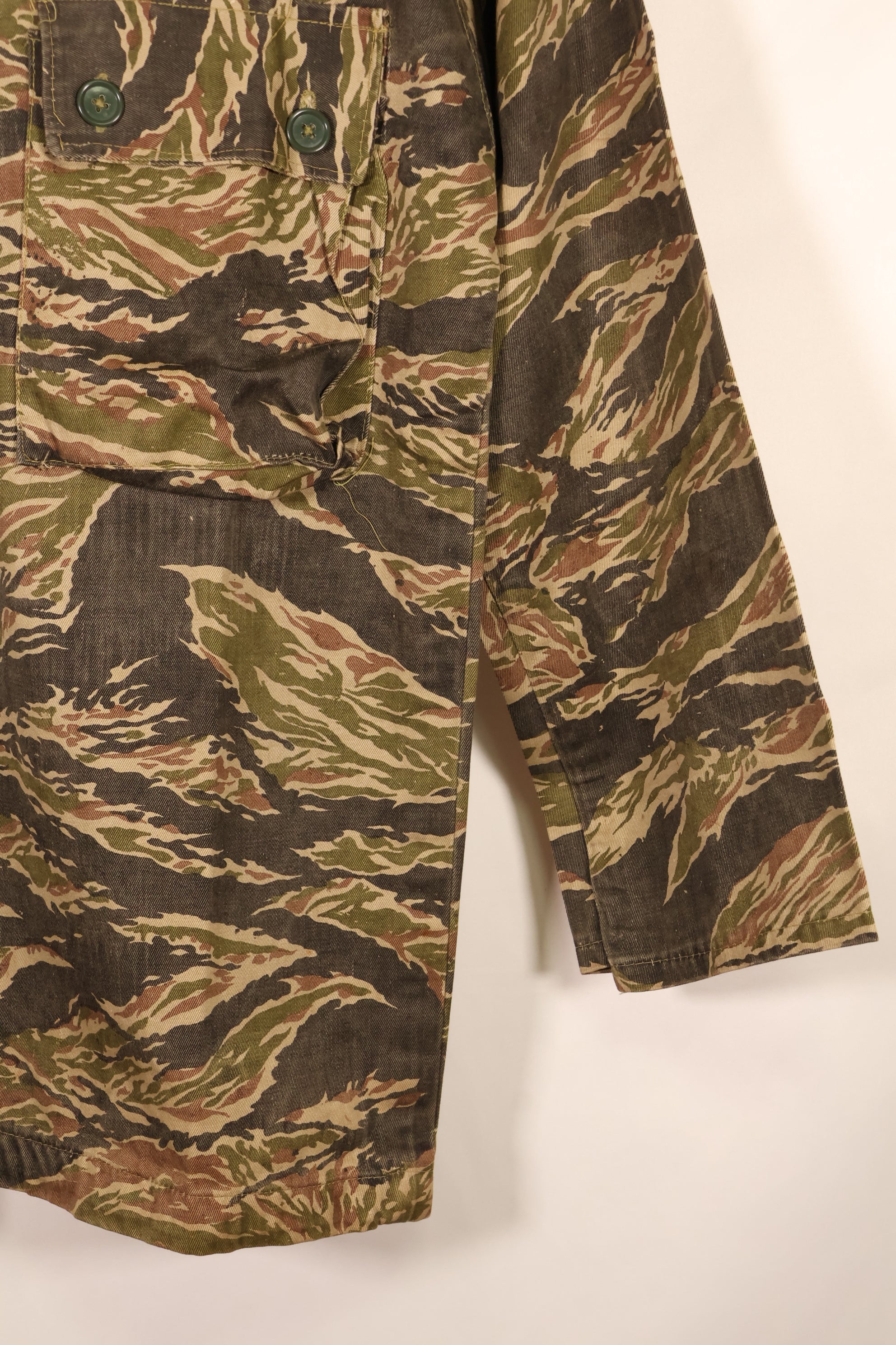 Late 1960s | Locally made | Estimated to be made in Vietnam or Thailand | Tiger-striped shirt | Used