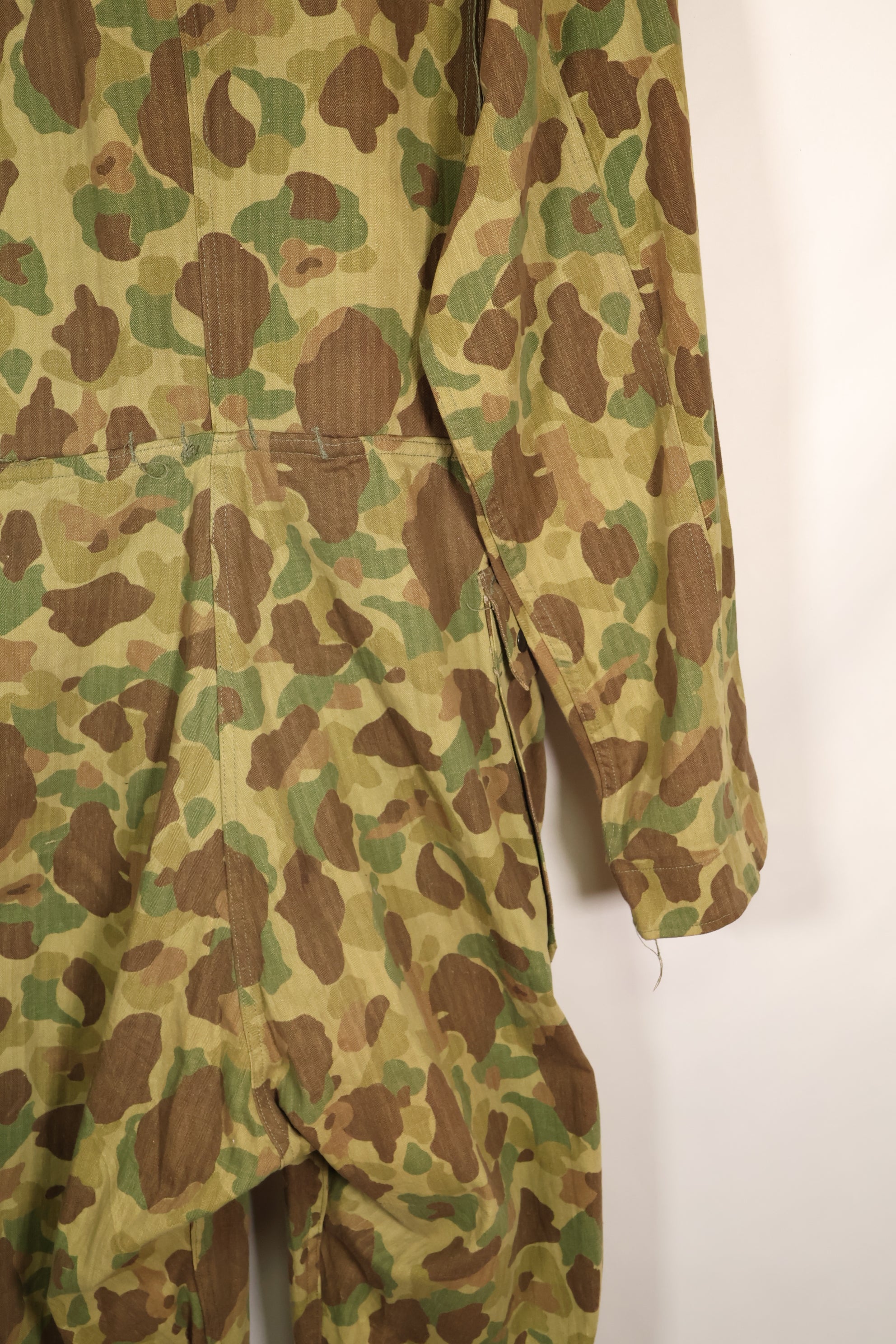 1940s U.S. Army & Marine Corps Frogskin camouflage coveralls in good condition.