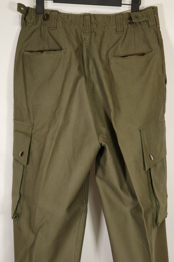 Real U.S. Army M45 pants with additional pocket modification, used.