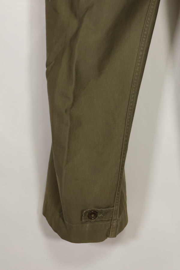 Real U.S. Army M45 pants with additional pocket modification, used.