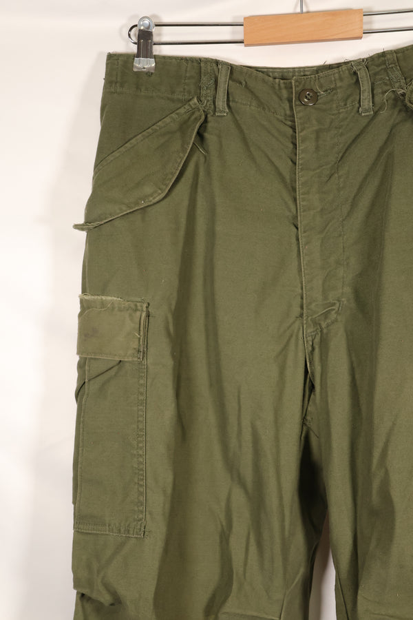 1970s lot, estimated size M-R, M65 field pants, cold weather specs, used.