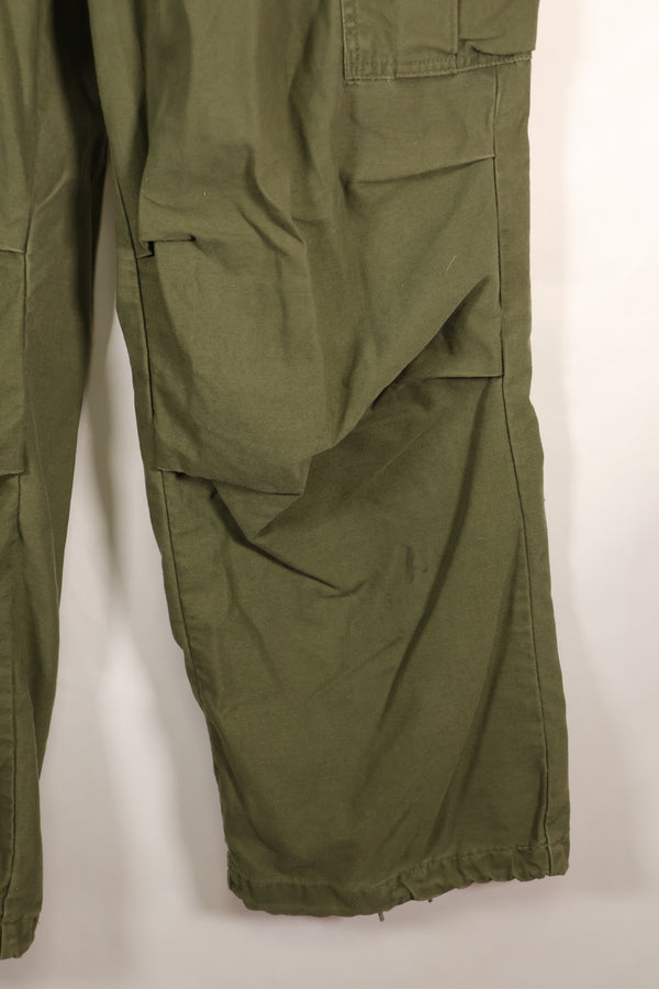1970s lot, estimated size M-R, M65 field pants, cold weather specs, used.