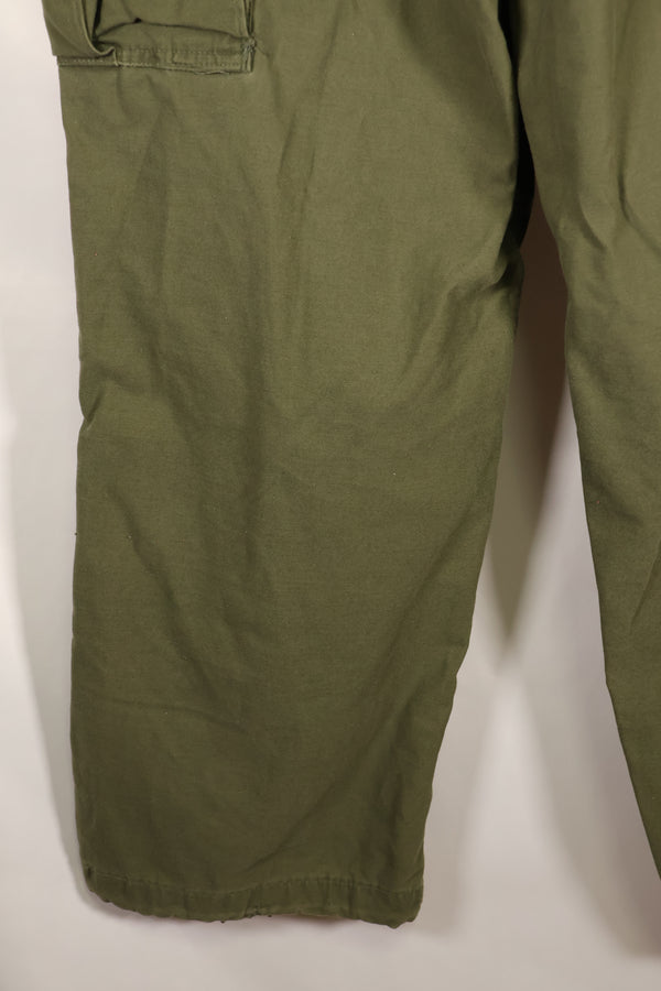 1970s lot, estimated size M-R, M65 field pants, cold weather specs, used.