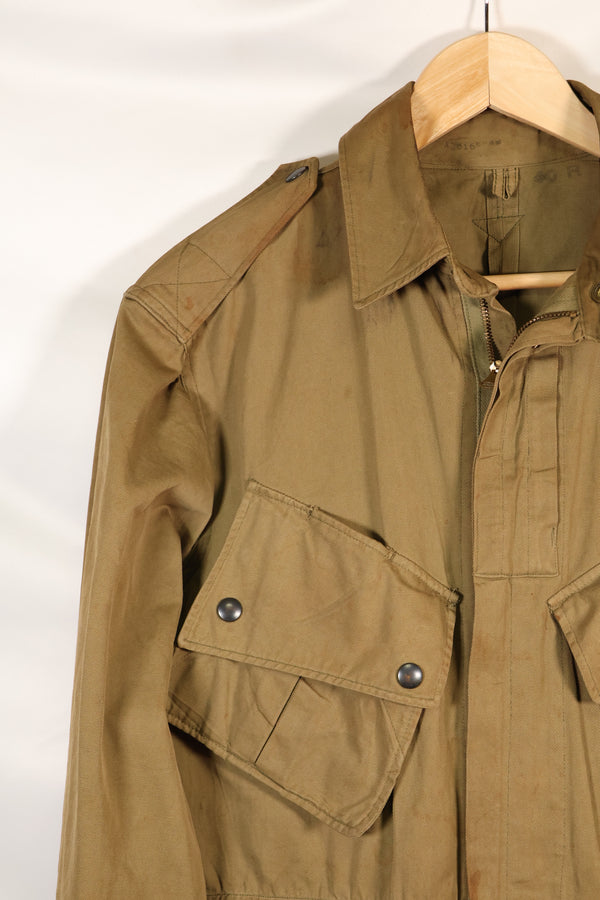 1940s 40R WWII M42 jump jacket without waist belt, stained, used.