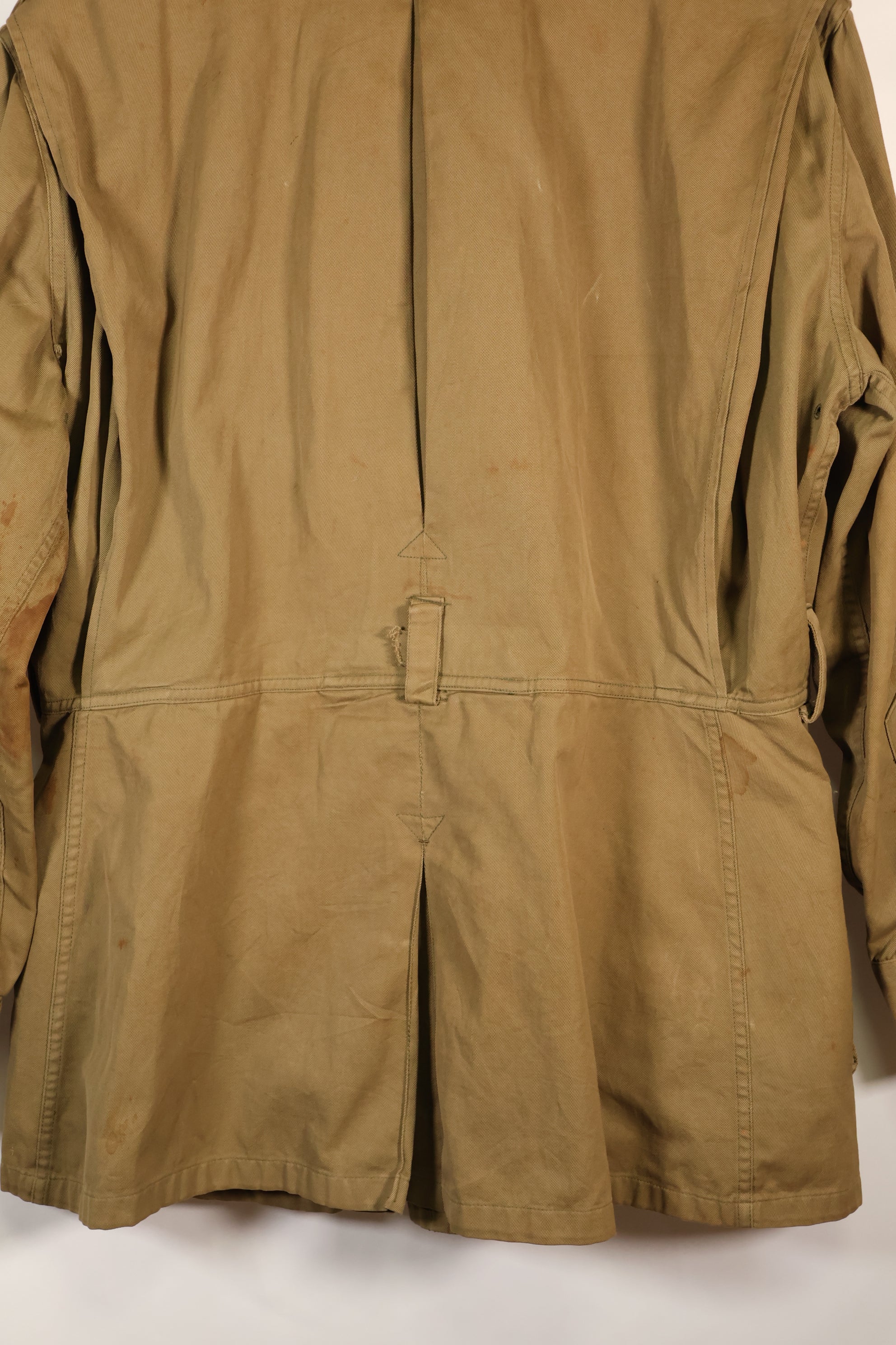 1940s 40R WWII M42 jump jacket without waist belt, stained, used.
