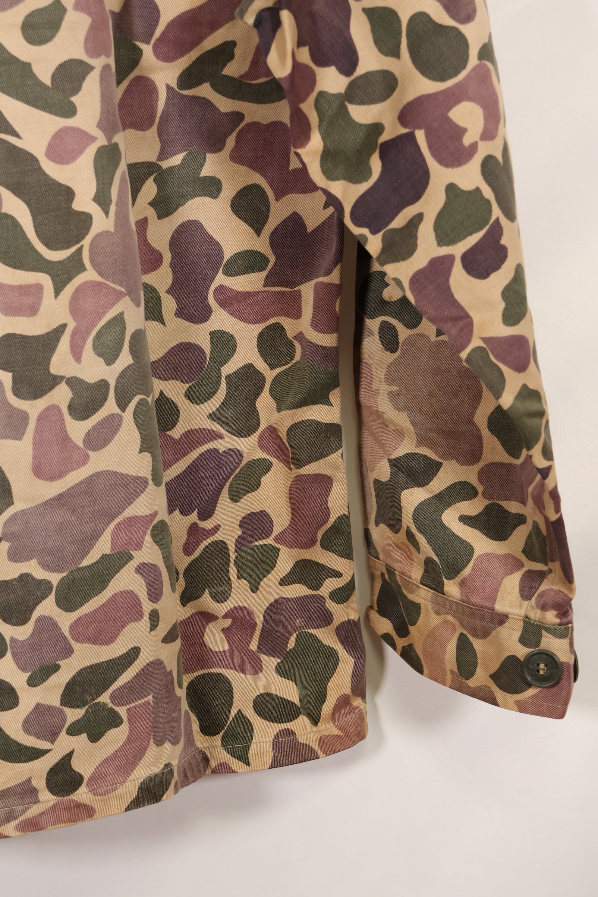 Early 1960s, faded, estimated A-L CIDG, beogum camouflage Asian cut shirt.