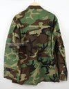 Real U.S. Army Woodland Camouflage Jacket, 2000, with patches.