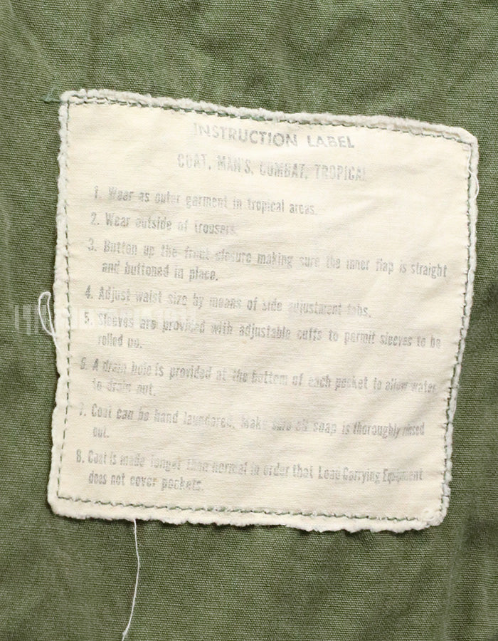 Real 2nd model jungle fatigues jacket, worn, scratched, faded.