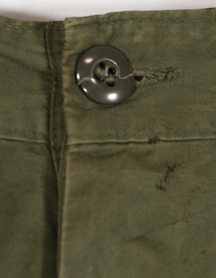 Real 1967 Poplin jungle fatigues pants, used, button damaged.