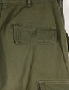 Real 1967 Poplin jungle fatigues pants, used, button damaged.