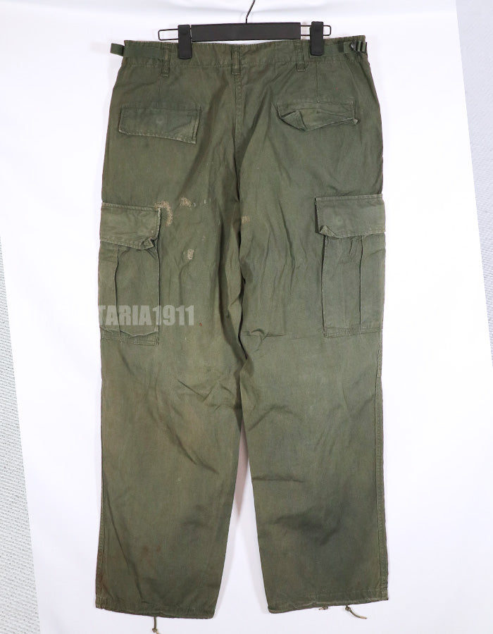 Real 1967 poplin fabric jungle fatigues pants, used, repaired.