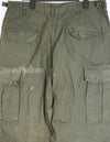 Real 1967 poplin fabric jungle fatigues pants, used, repaired.