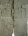 Real 1967 poplin fabric jungle fatigues pants, used, repaired.